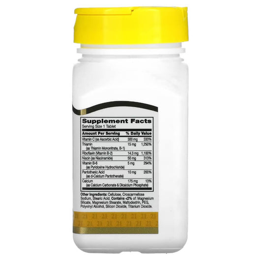 Supplement bottle with yellow cap and label on a white background