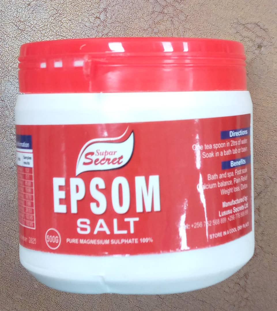 Jar of Epsom salt with a red label on a textured surface