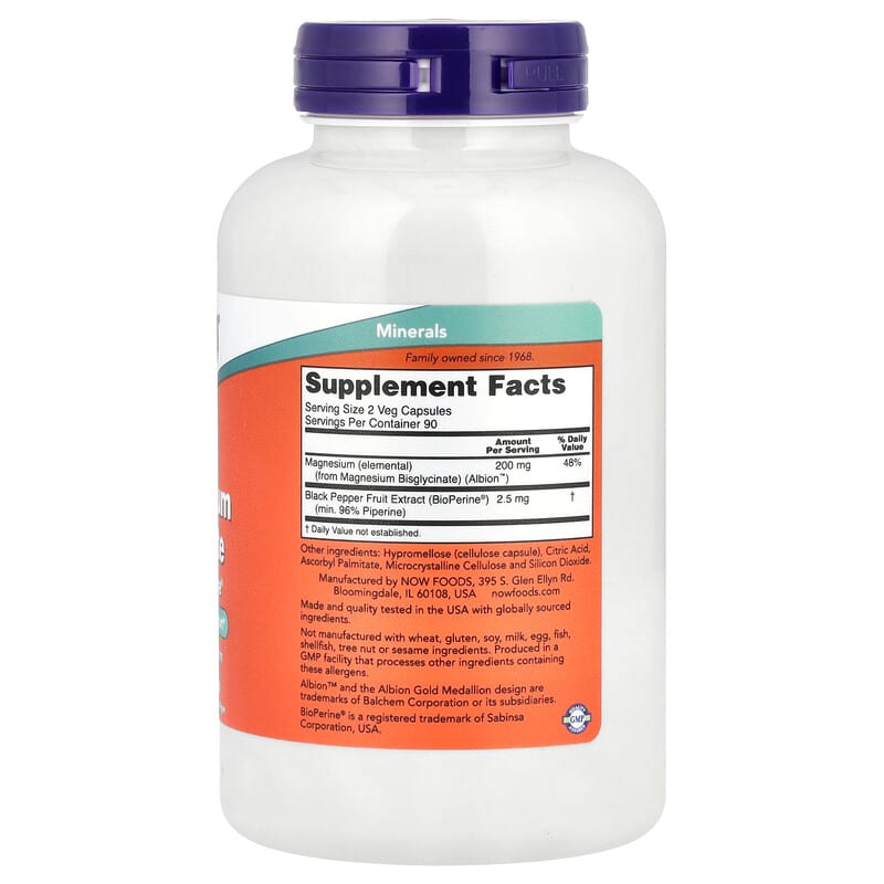 Supplement bottle with purple cap and orange label on a white background
