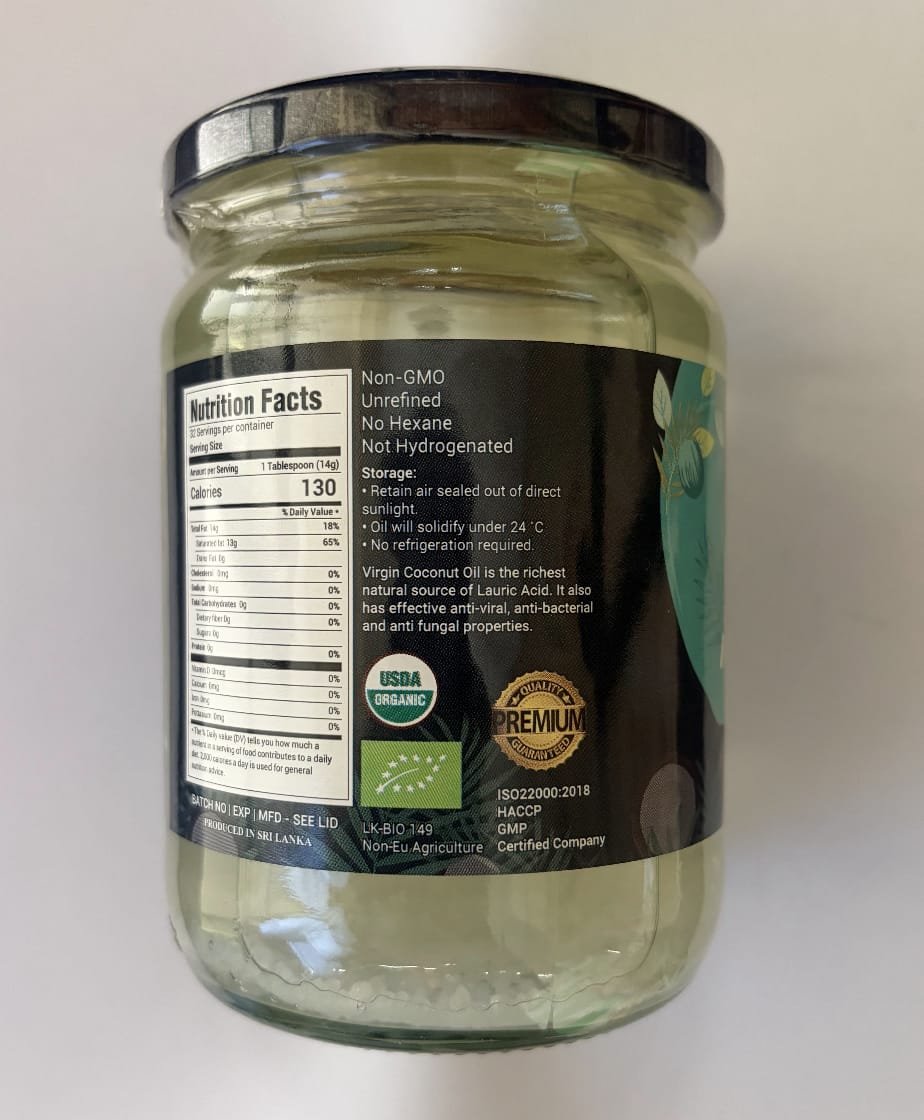 Jar of coconut oil with label on a white background