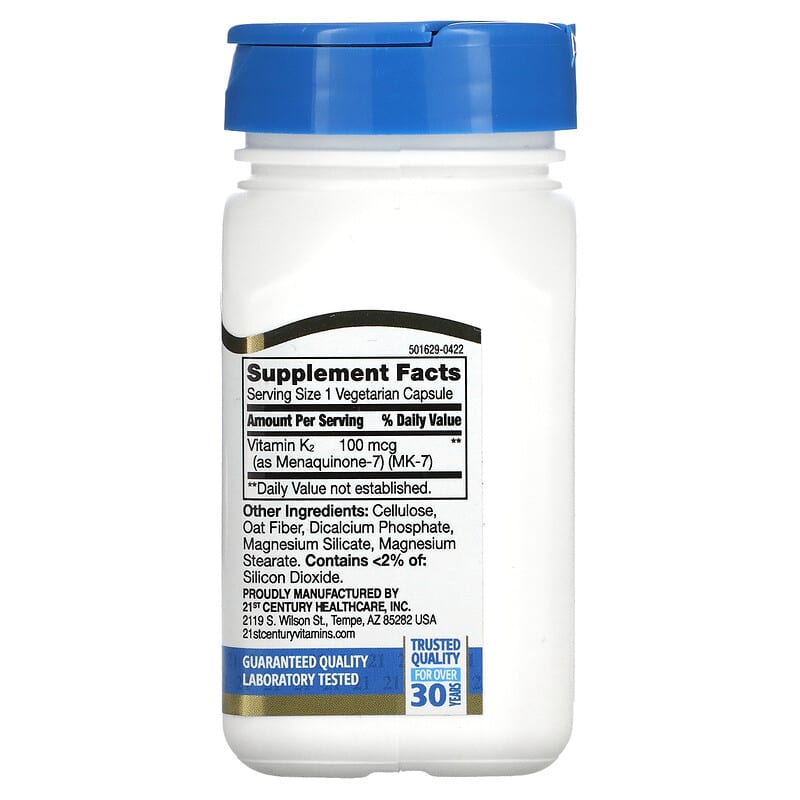 Supplement bottle with blue cap and white label on a white background