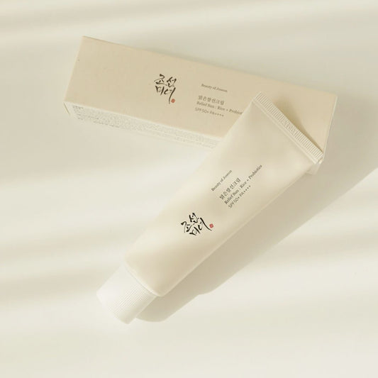 Skincare product and packaging on a light beige background BEAUTY OF JOSEON