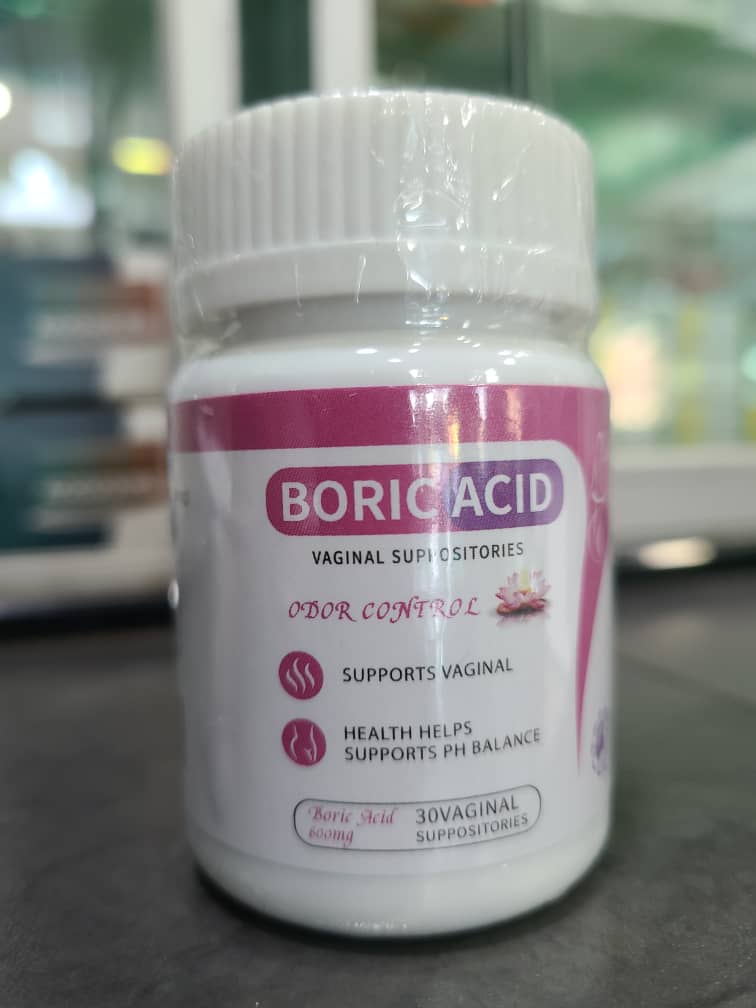 Boric acid suppository container with a blurred background