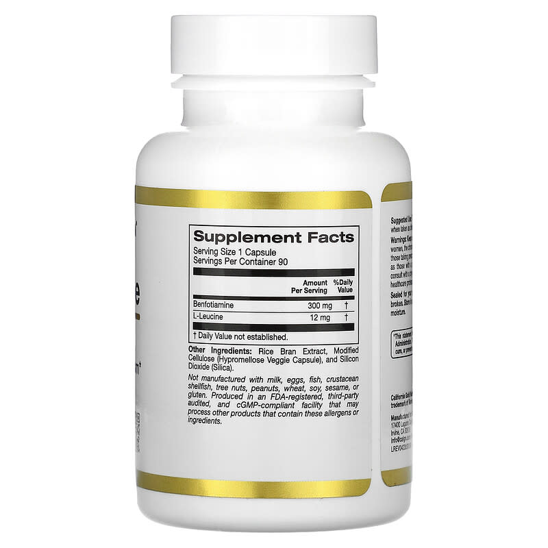 Supplement bottle with gold label on a white background