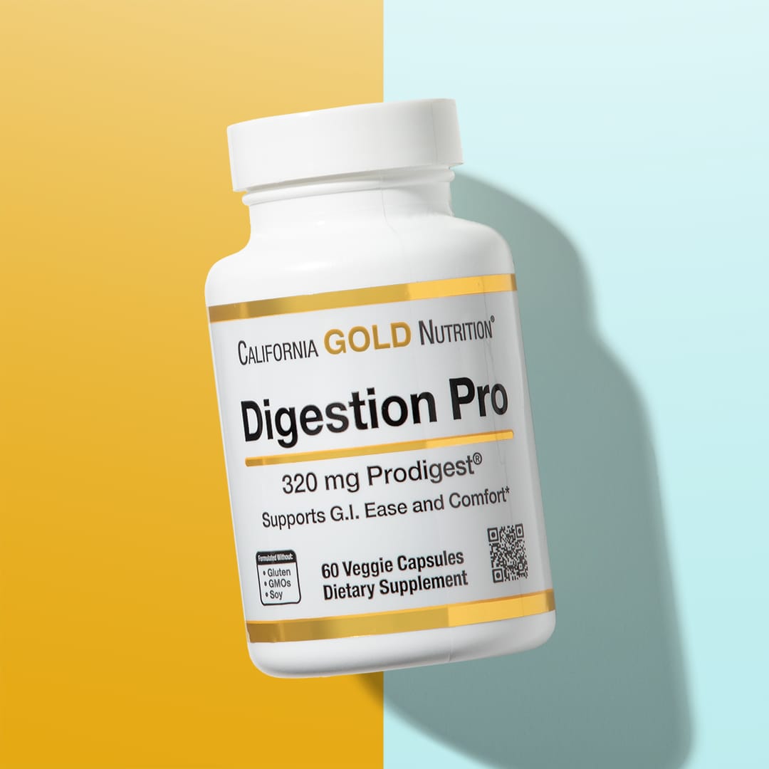 California Gold Nutrition Digestion Pro supplement bottle on a two-tone yellow and blue background