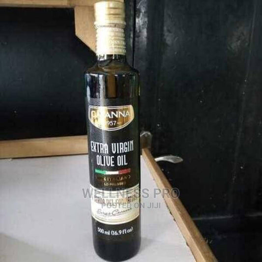 Bottle of CAVANNA extra virgin olive oil on a black background
