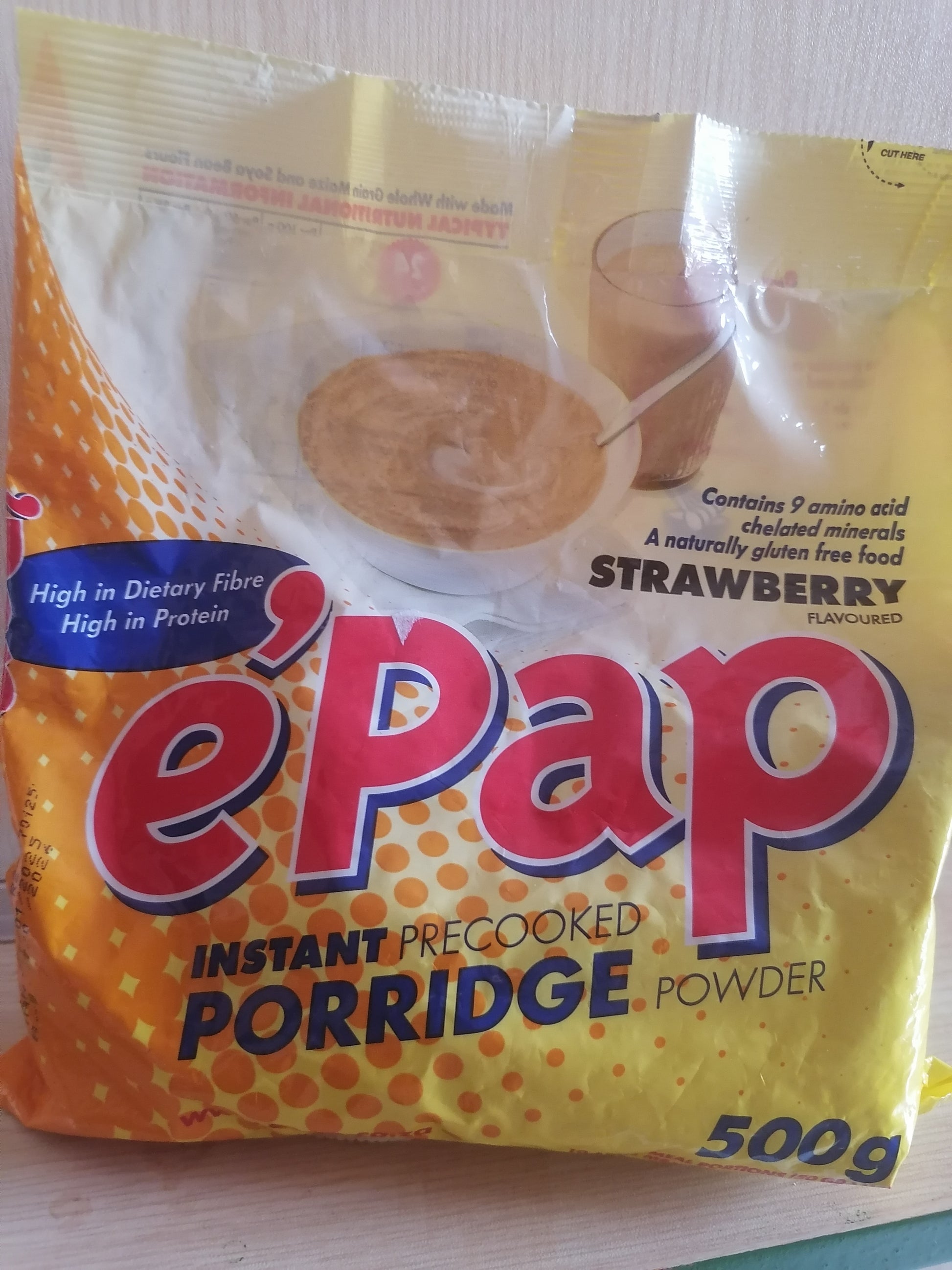 Package of e-pap instant precooked porridge powder with strawberry flavor on a white background