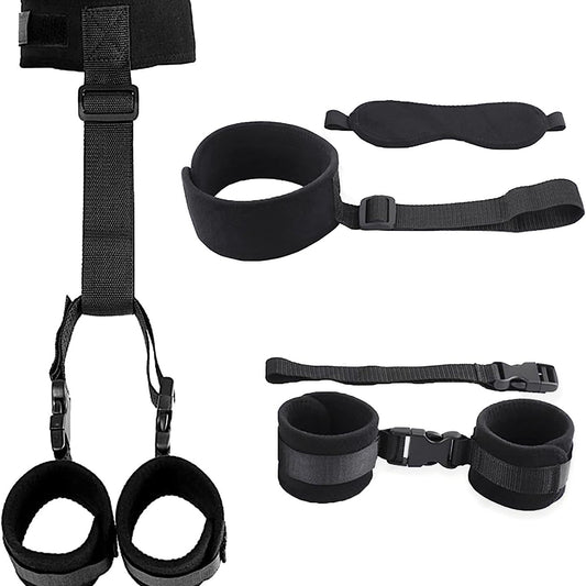 Black restraint set including blindfold, cuffs, and straps on a white background