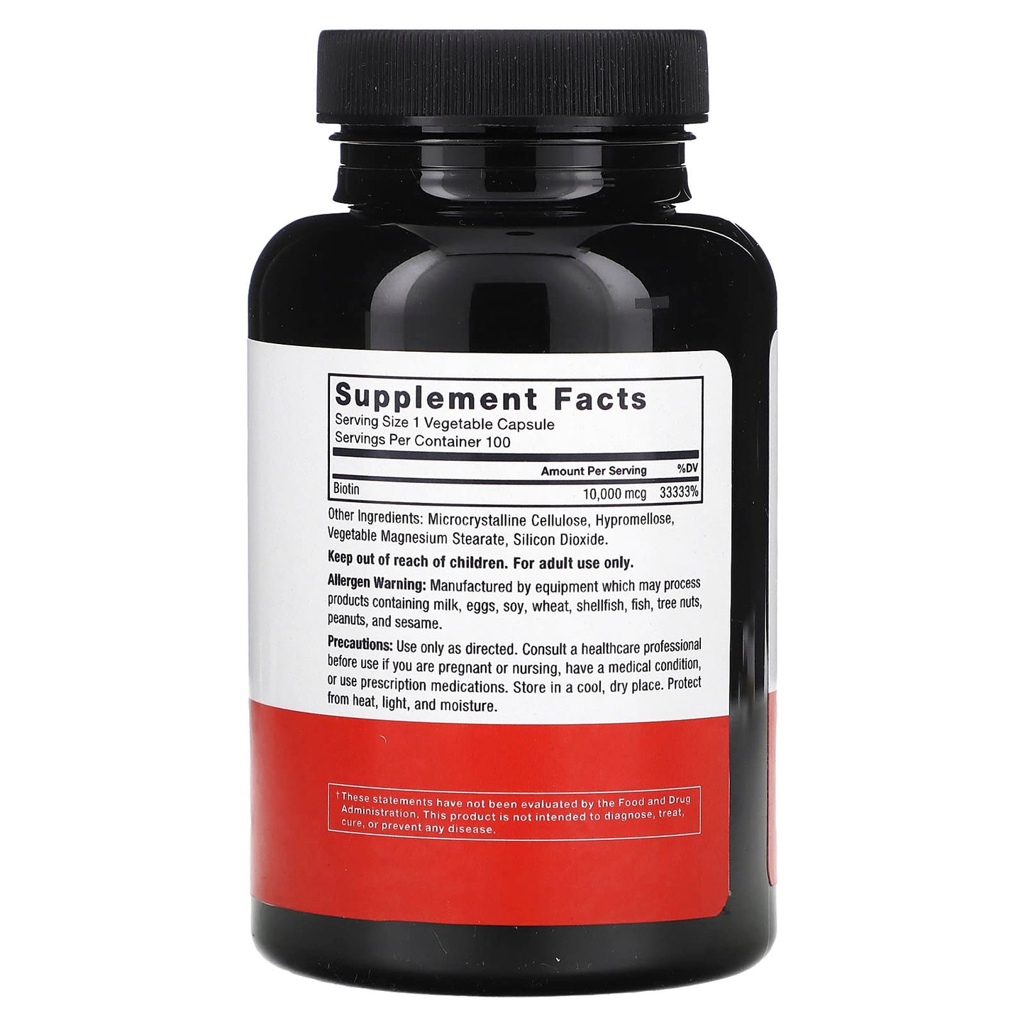 Black supplement bottle with a white label on a white background