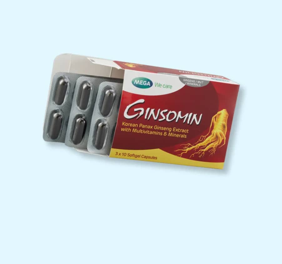 Box of Ginsomin capsules with a red label on a light blue background
