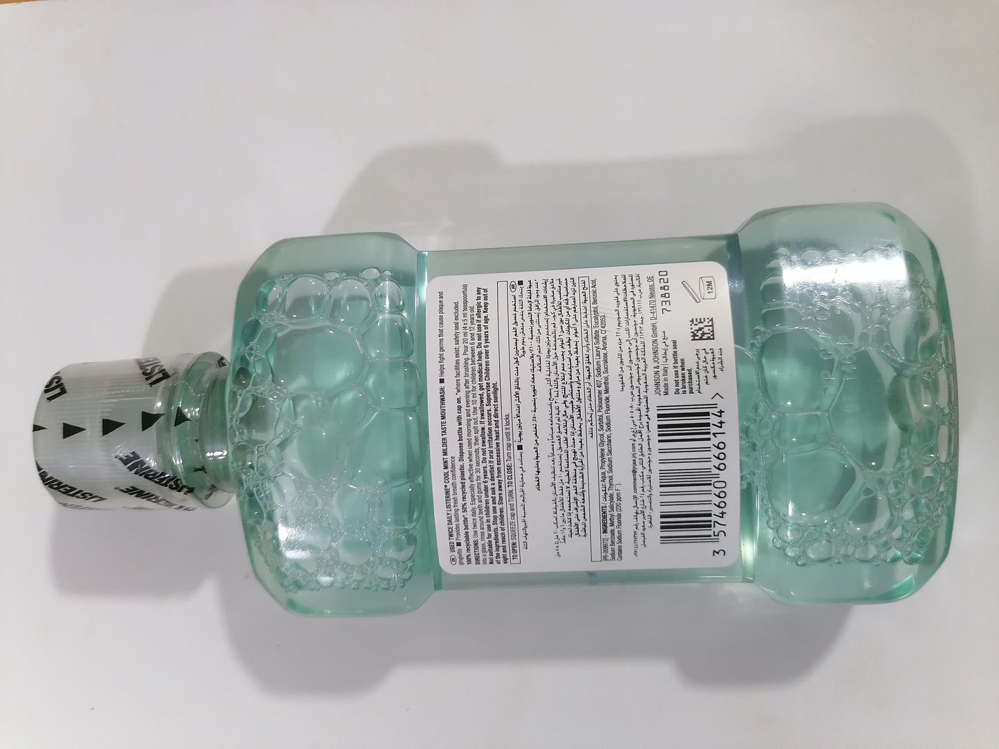 Clear bottle with a label on a white background