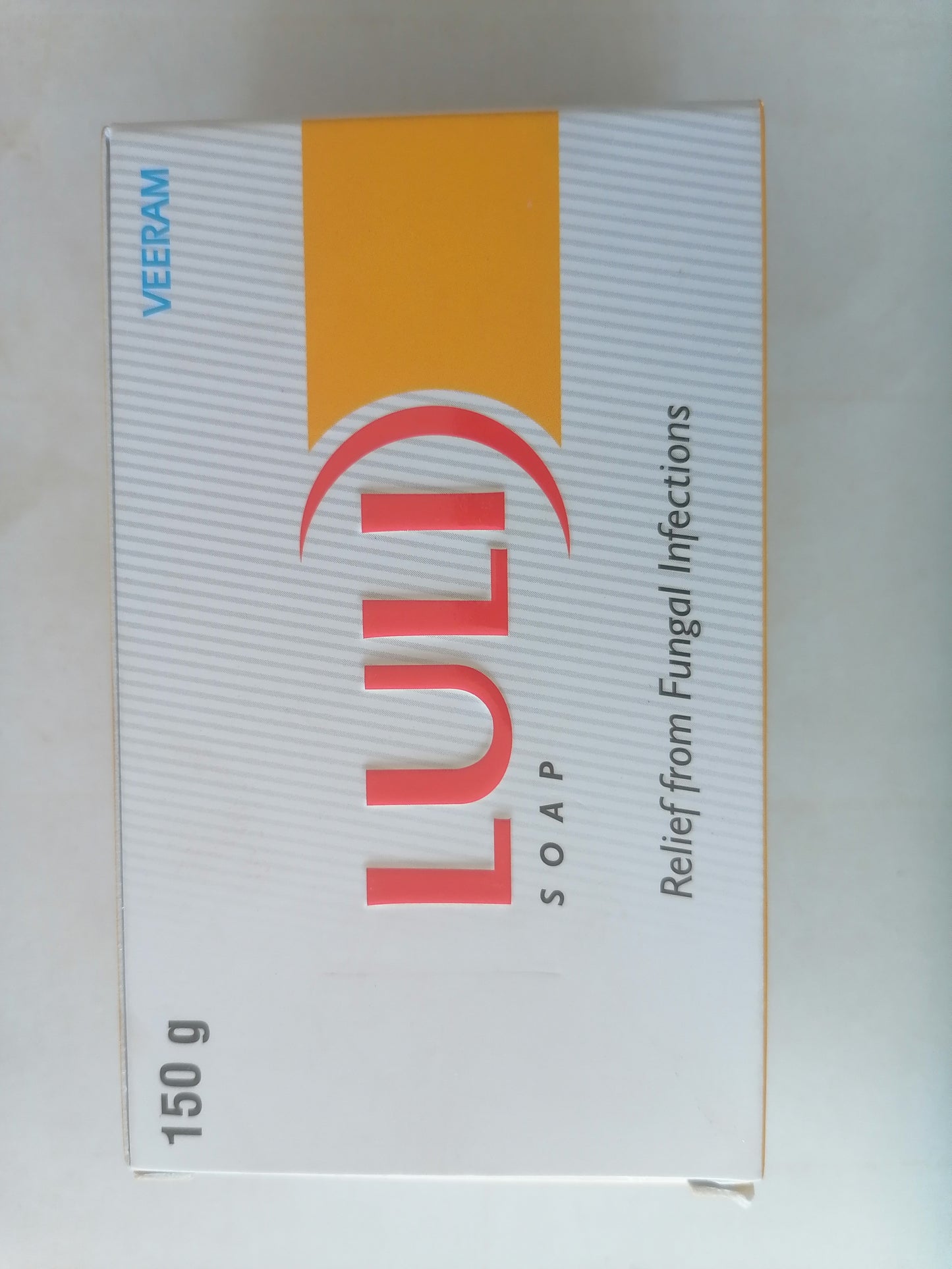 Box of LULI soap with branding and product details on a white background