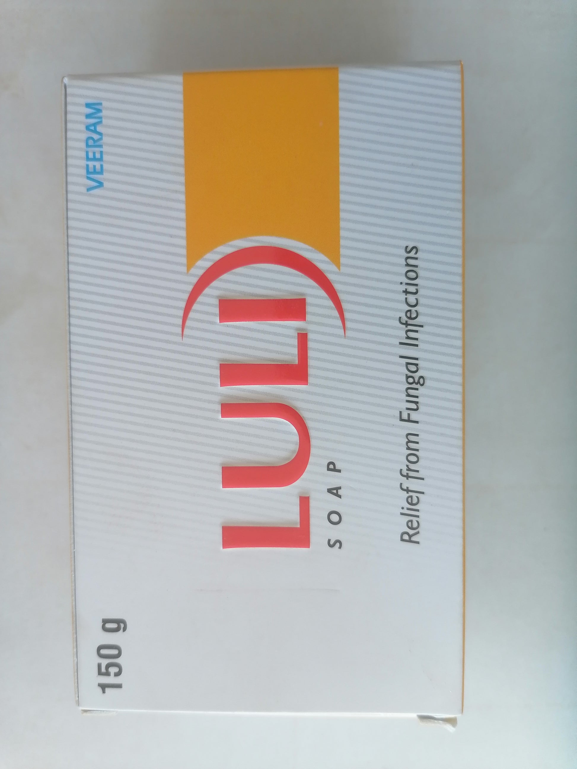 Box of LULI soap with branding and product details on a white background