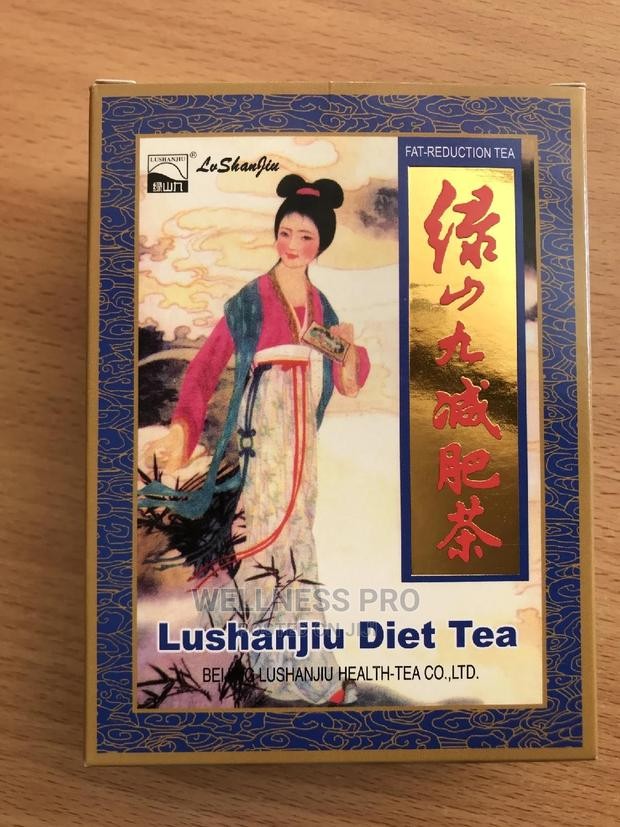 Lushanjiu Diet Tea packaging with an illustration of a woman on a wooden surface