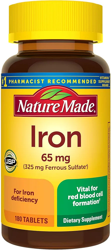 Nature Made Iron supplement bottle with yellow cap and label.