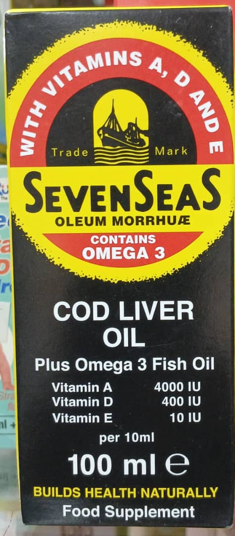 Seven Seas Cod Liver Oil supplement packaging with vitamins A, D, and E on a black background.