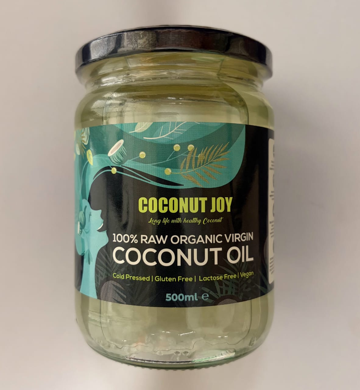 Jar of Coconut Joy coconut oil on a white background