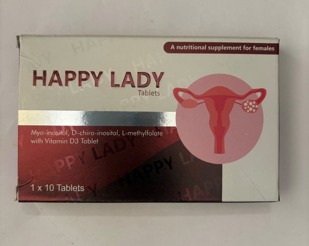 Box of 'Happy Lady' nutritional supplements for females on a white background