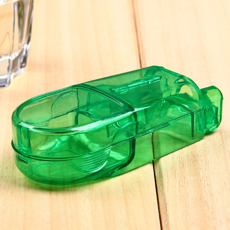 Coupe-comprimé rectangulaire transparent avec compartiment de rangement vert