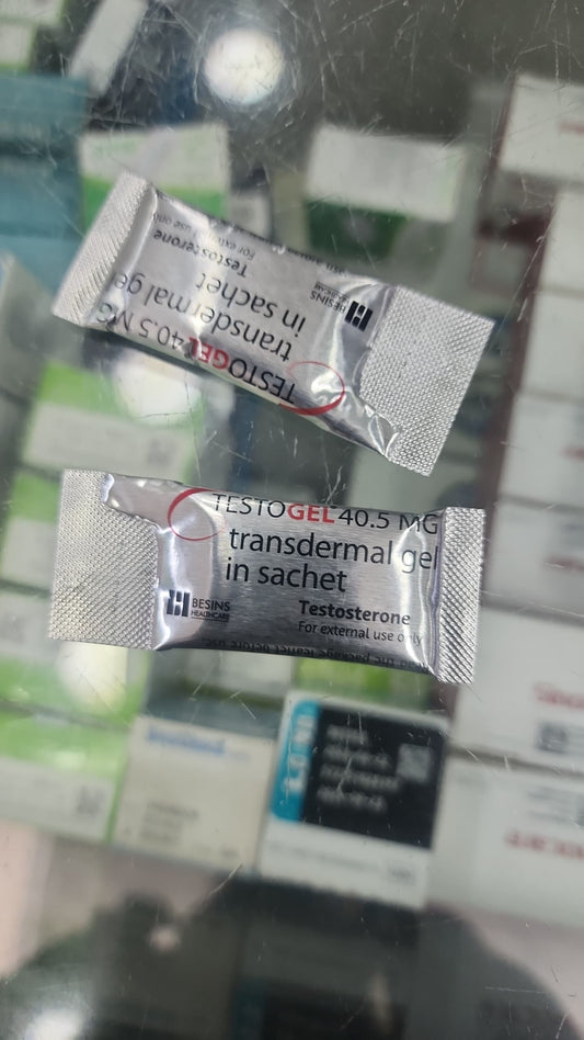 Two packages of Testogel transdermal gel on a blurred background